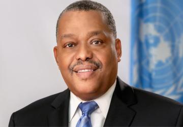 Dr. Garry Conille